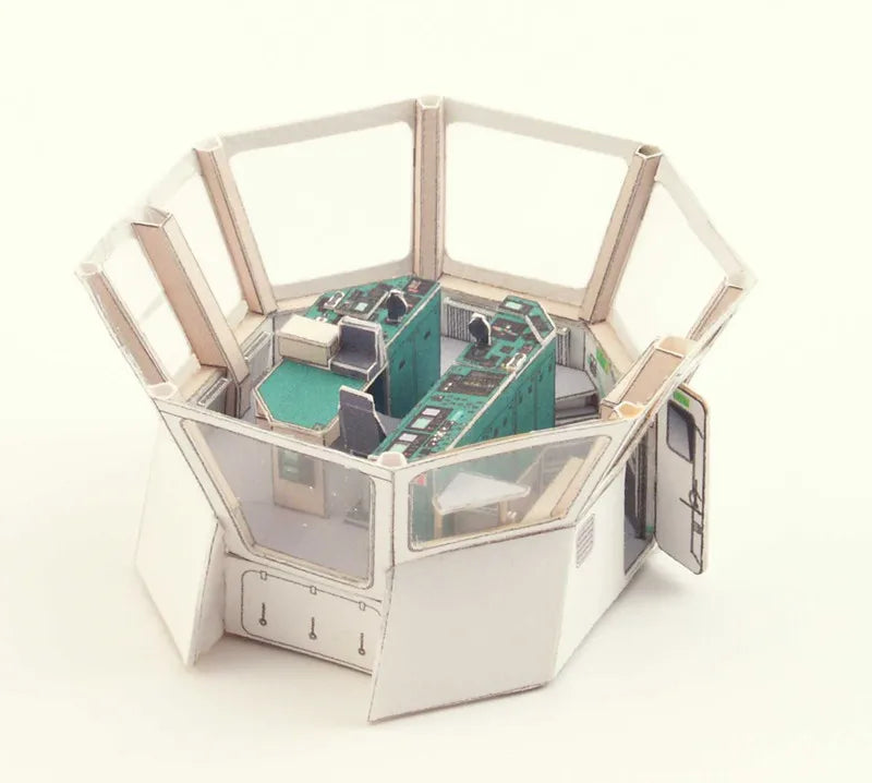 Hexagonal structure with electronic components on a white background