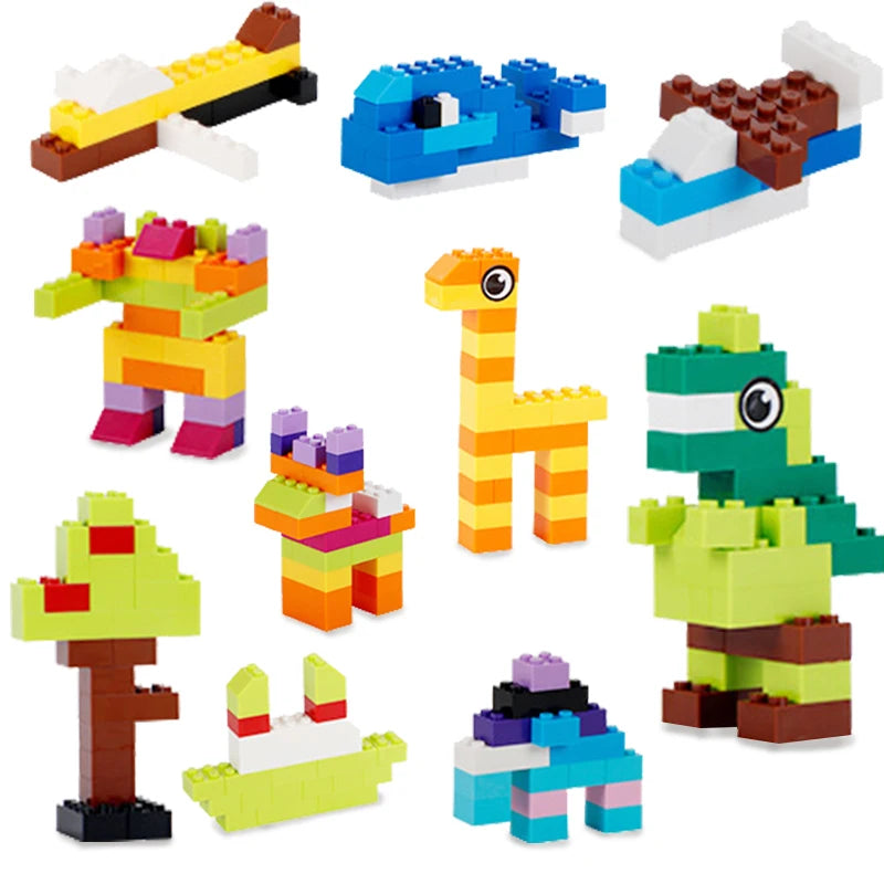 Colorful building block toys shaped like animals on a white background