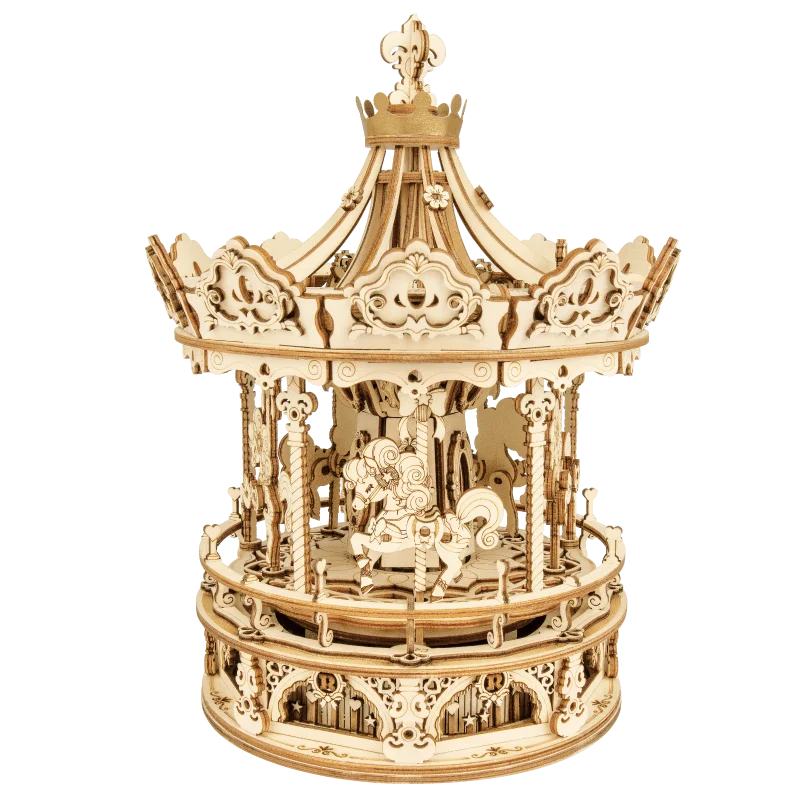 Wooden model of a carousel with intricate details on a white background