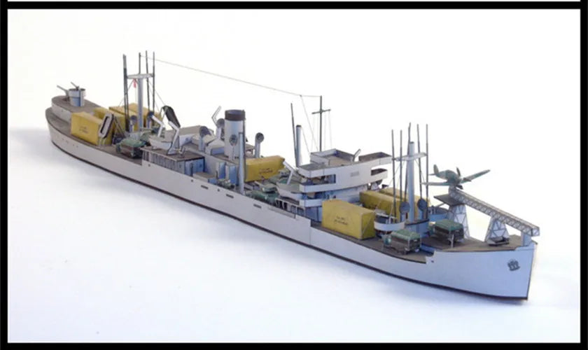 Model of a cargo ship on a white background