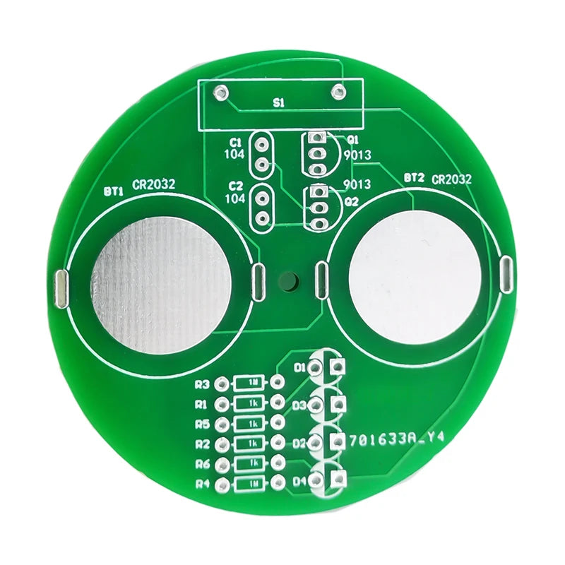 Green round electronic circuit board with white components on a white background
