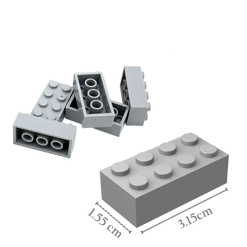 Gray building blocks with text indicating compatibility and dimensions on a white background