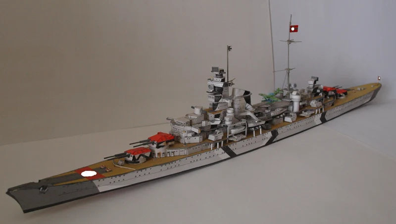Model of a battleship on a plain background