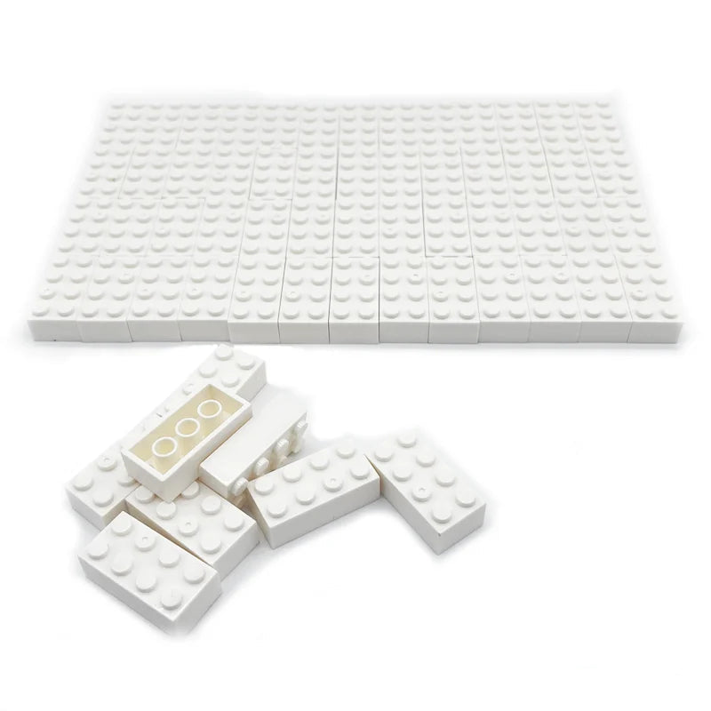 White building blocks and baseplate with 'DIY Building Toys' text on a white background