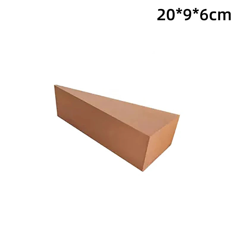 Triangular cardboard block with dimensions 20*9*6cm on a white background