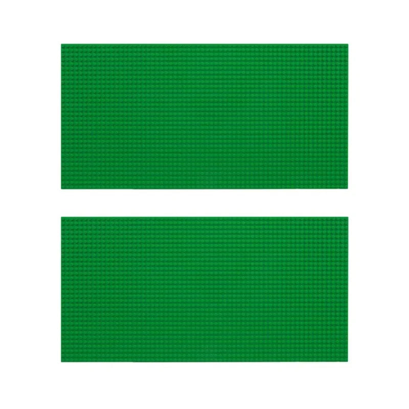 Two green rectangular building blocks on a white background