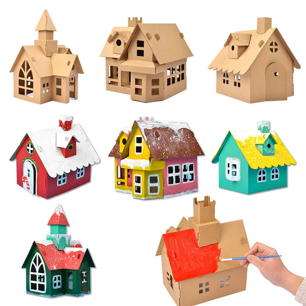 Set of colorful cardboard houses with a hand painting one of them.