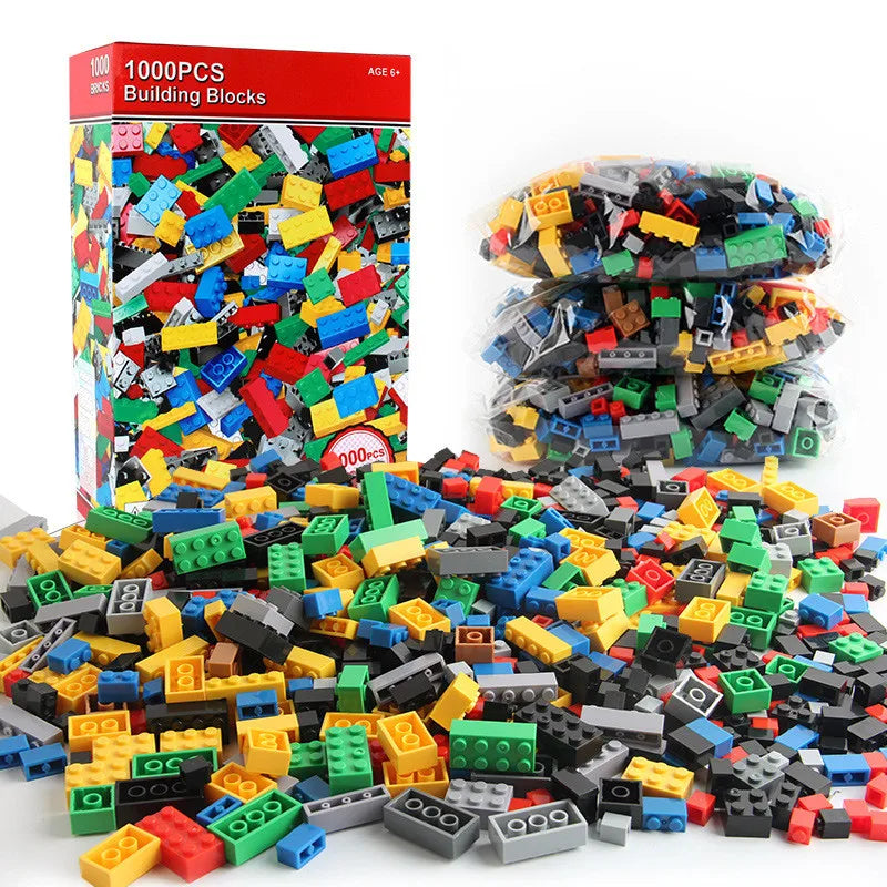 Colorful building blocks with a box labeled '1000 PCS Building Blocks' on a white background.