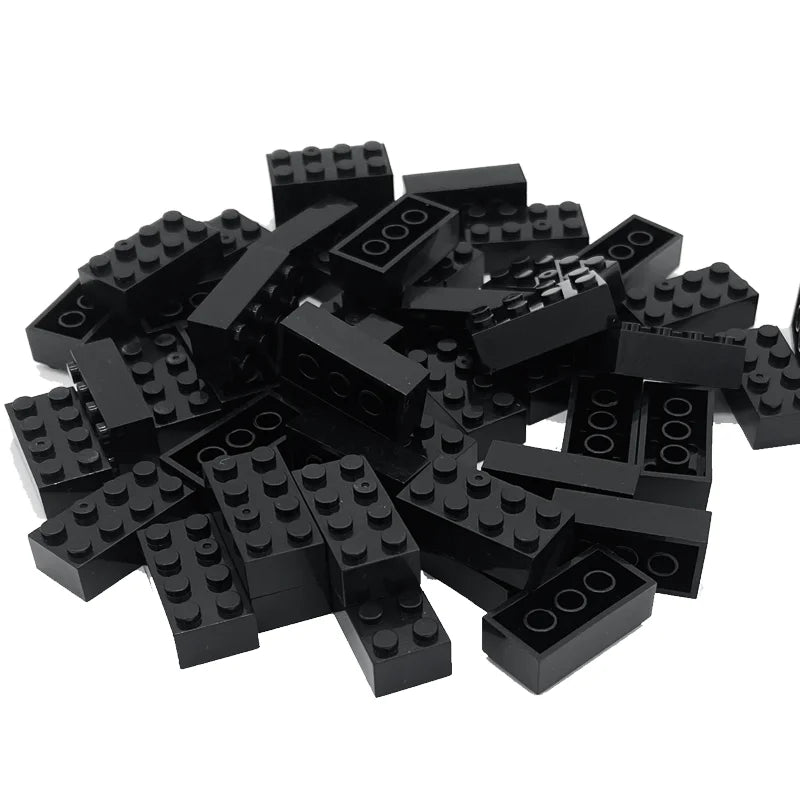 Pile of black building blocks on a white background