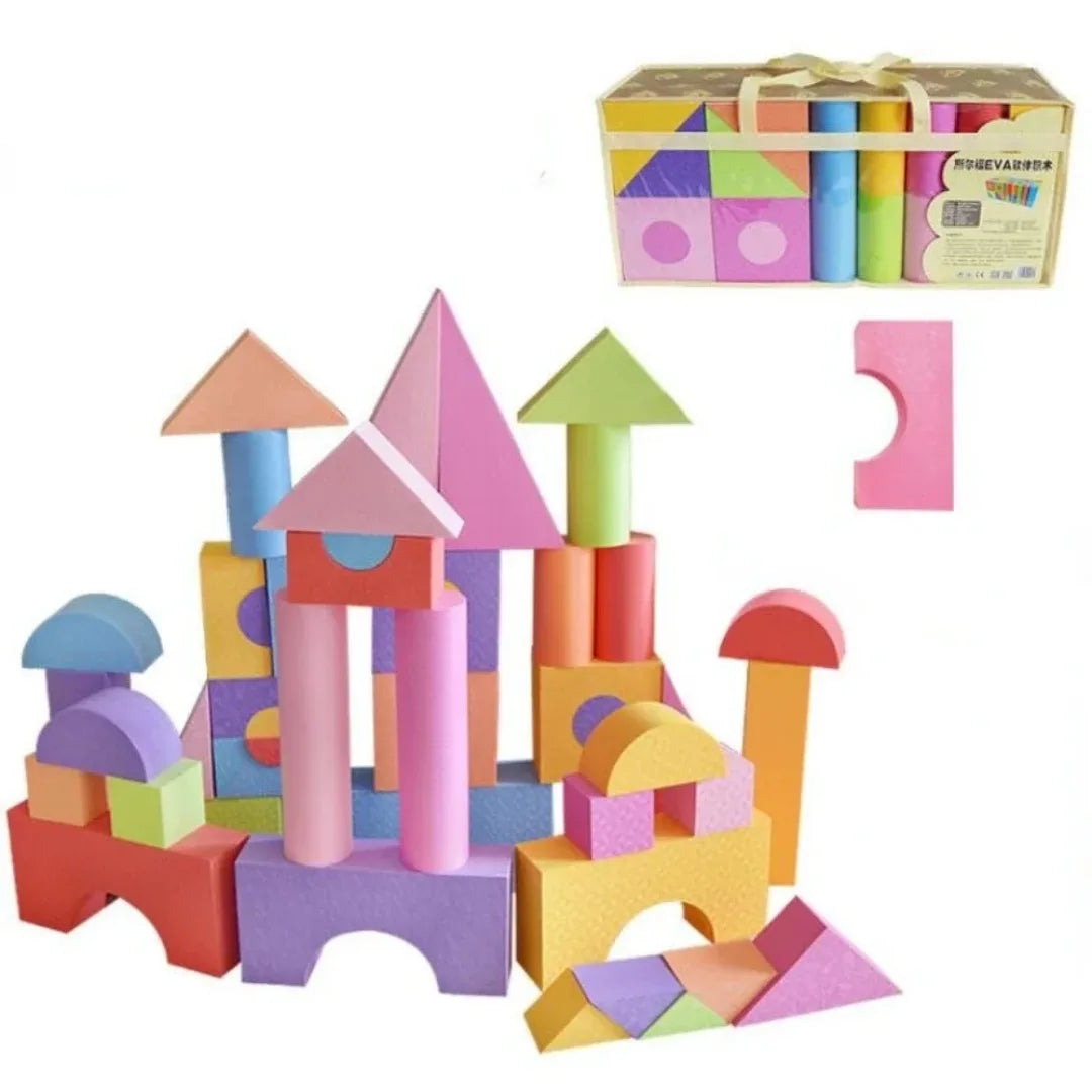 Colorful foam building blocks with a box of additional blocks in the background