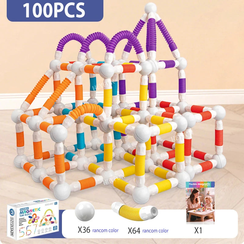 Colorful building block set with Miquel Rau packaging on a beige background