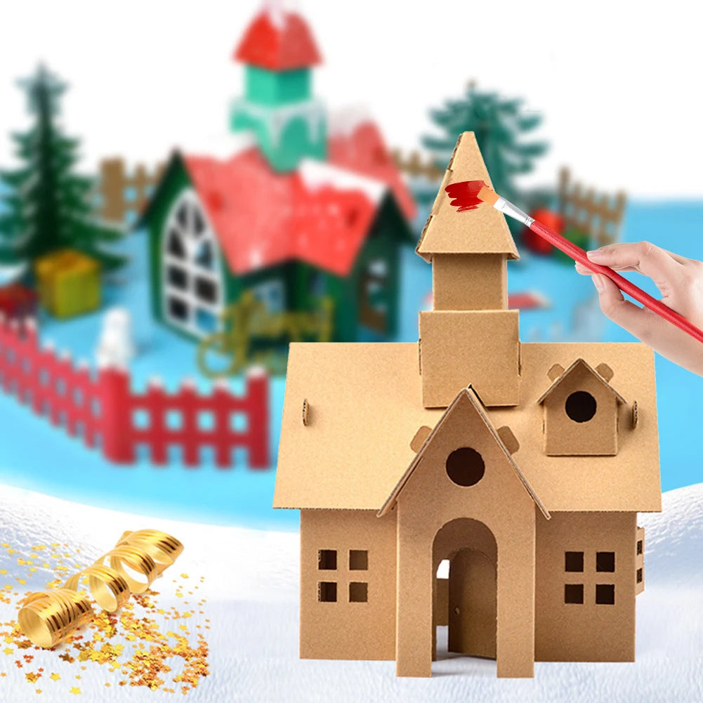 Cardboard house model with a hand painting it against a festive background