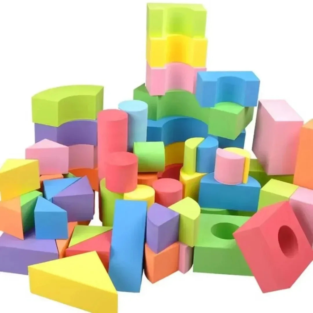 Colorful foam building blocks on a white background