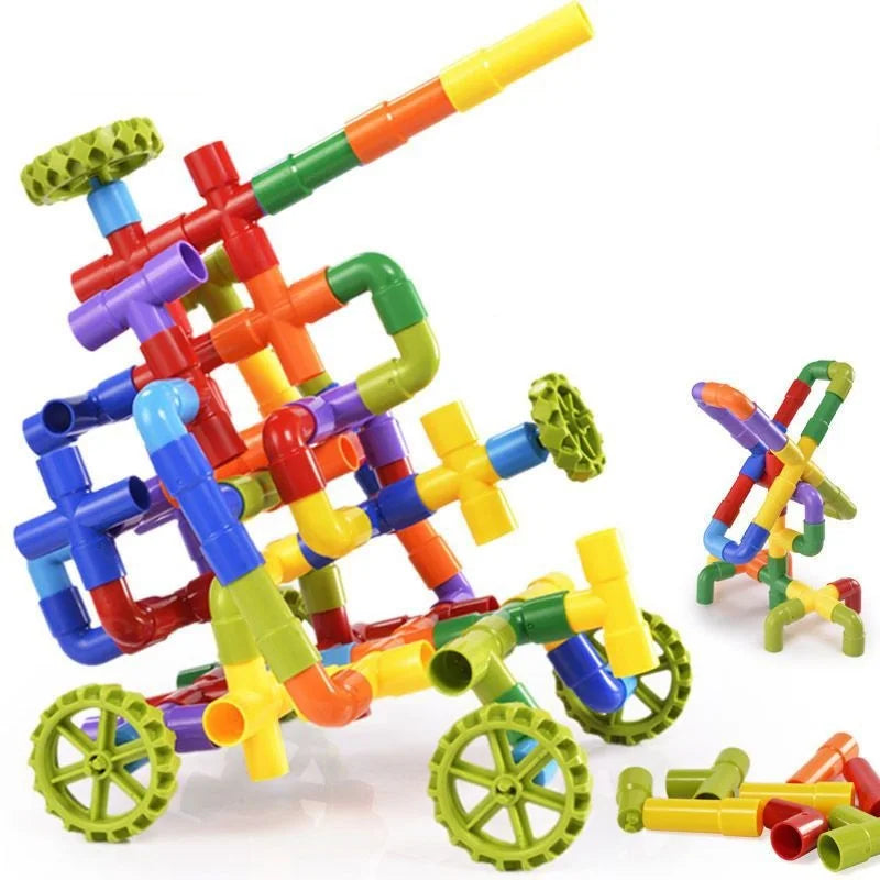Colorful plastic building blocks with wheels on a white background