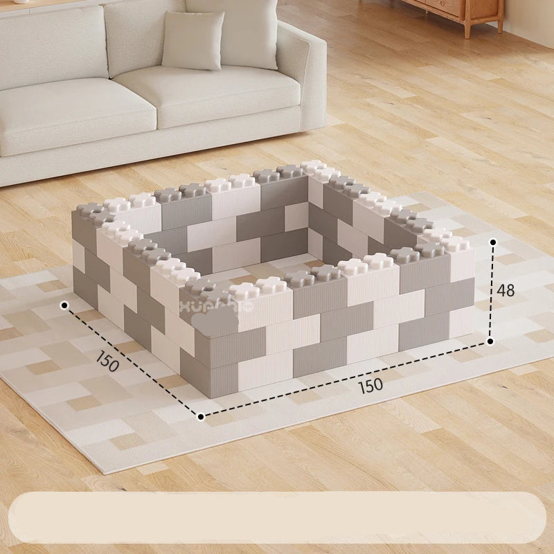 Children's building block set on a wooden floor with dimensions displayed