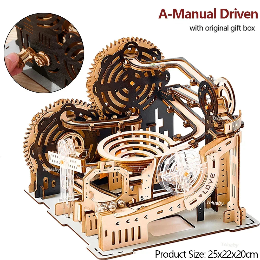 Wooden mechanical model with gears and a hand interacting with it, on a white background.
