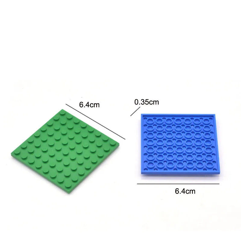 Two square building blocks, one green and one blue, with measurements indicated on a white background.