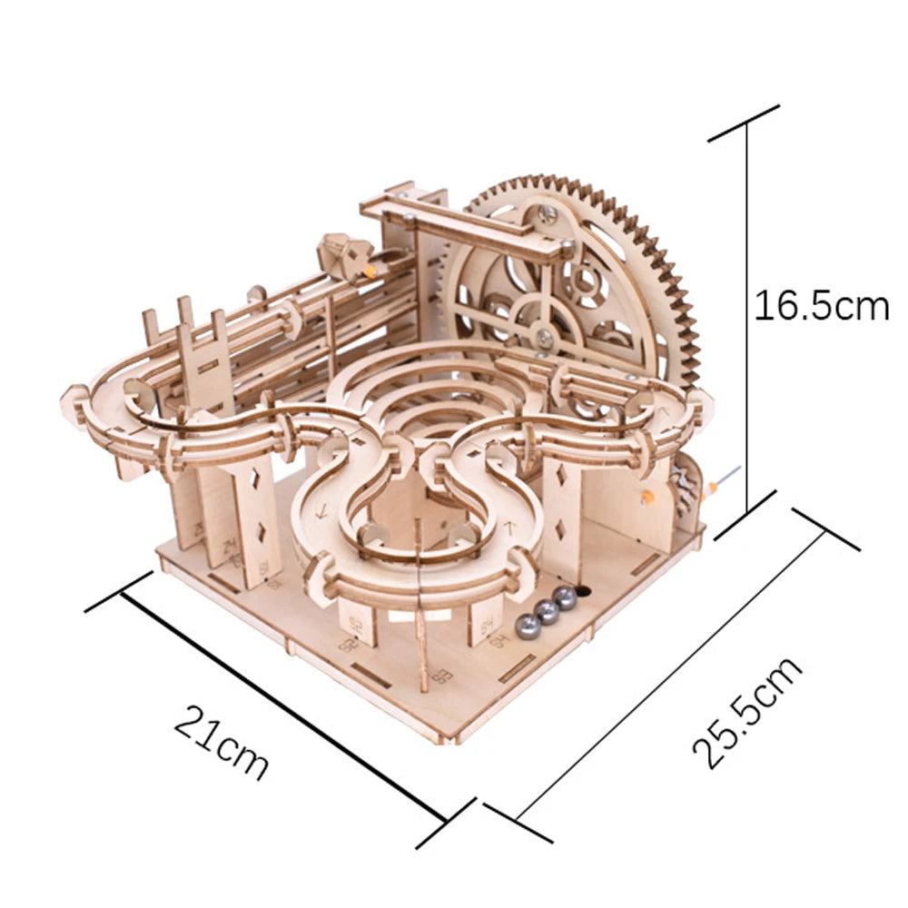 Wooden mechanical model with gears and ball track, shown with dimensions on a white background