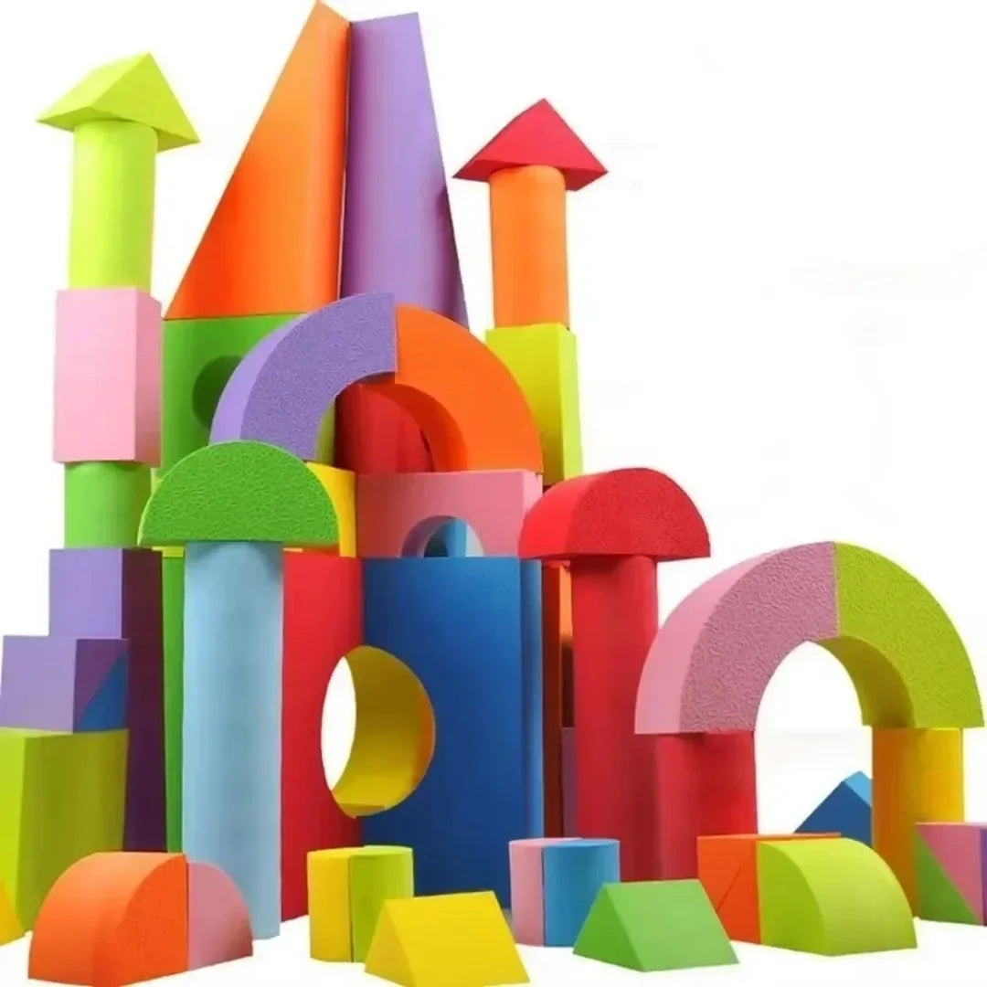 Colorful foam building blocks on a white background