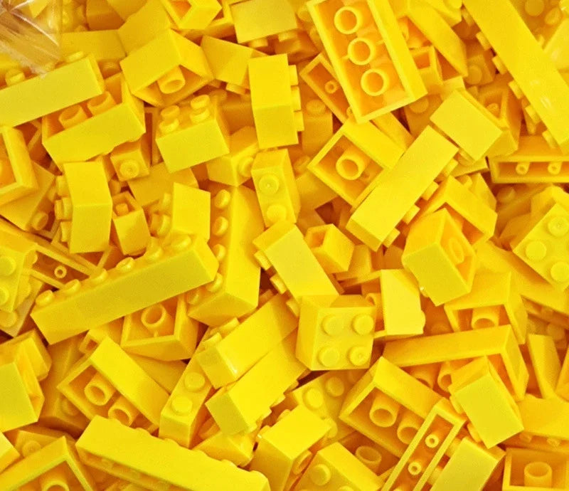 Close-up of a pile of yellow building blocks