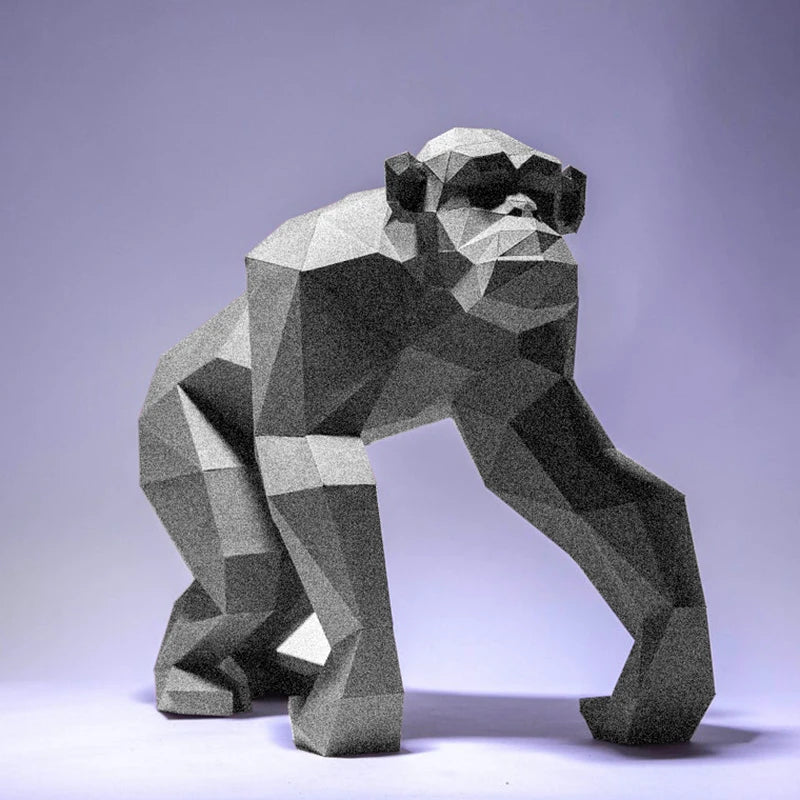 Geometric gorilla sculpture on a gray background