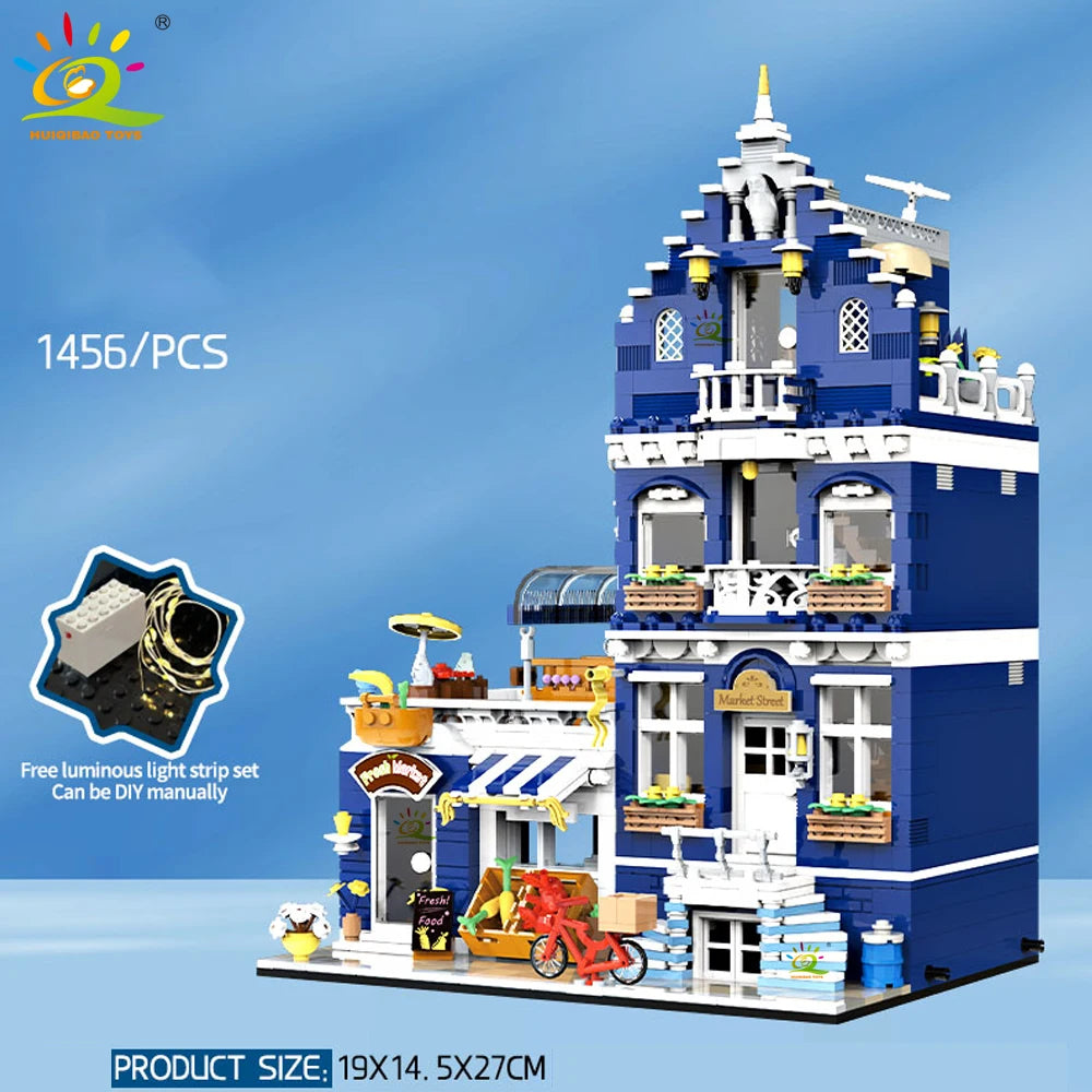 Toy building set with blue and white architecture on a blue background