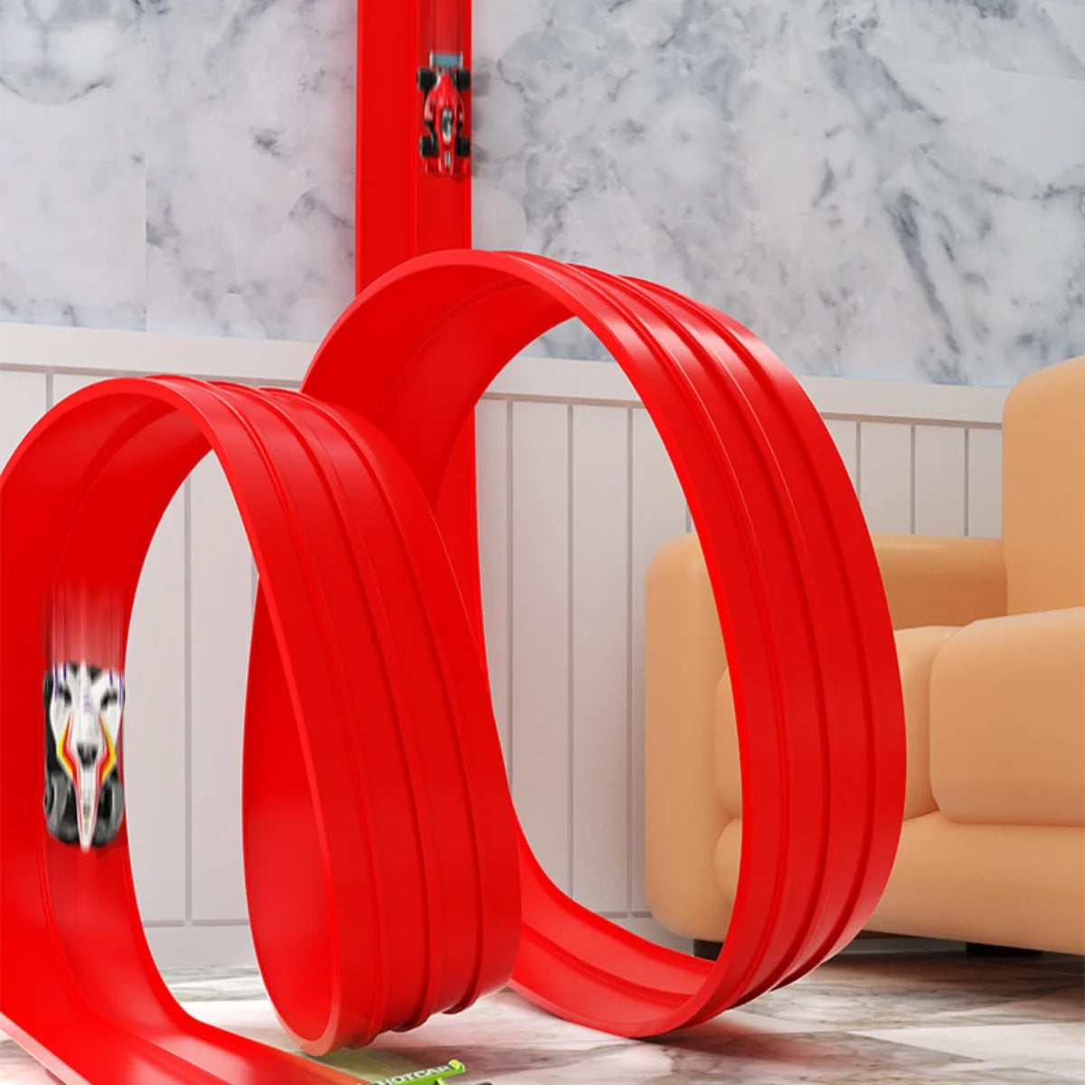 Red toy track with cars on a marble floor and beige sofa.