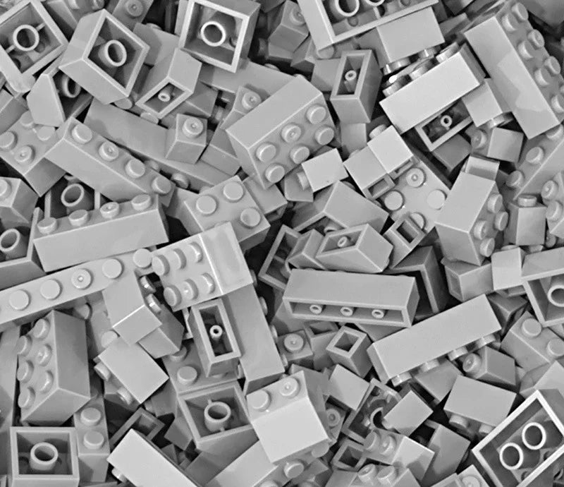 Close-up of a pile of gray building blocks