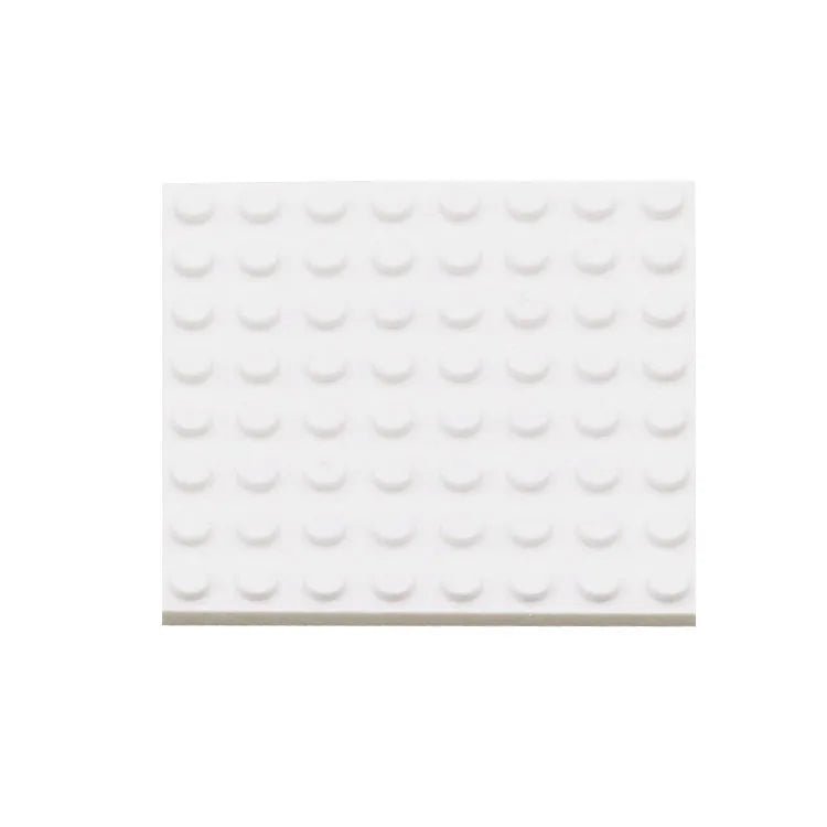 White building block baseplate with a grid pattern on a white background