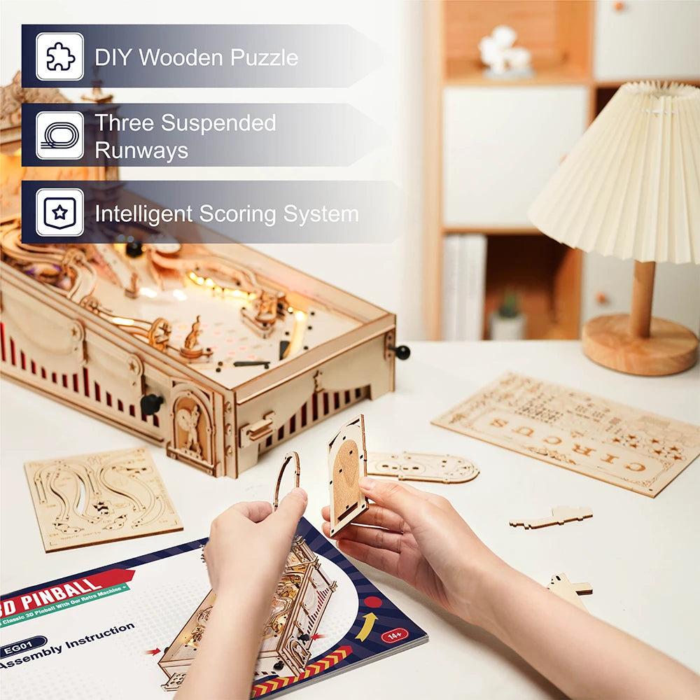 Person assembling a DIY wooden puzzle with components and instructions on a table.