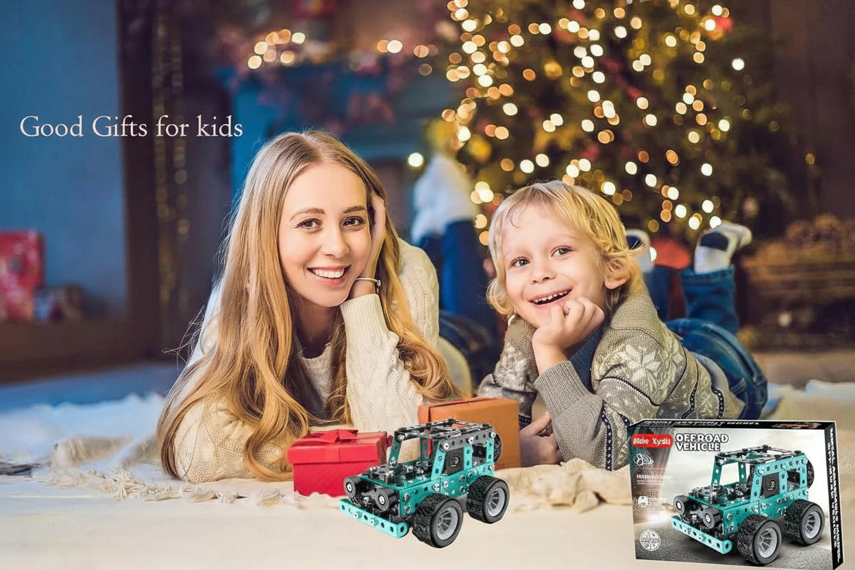 Woman and child with toy cars in front of a Christmas tree