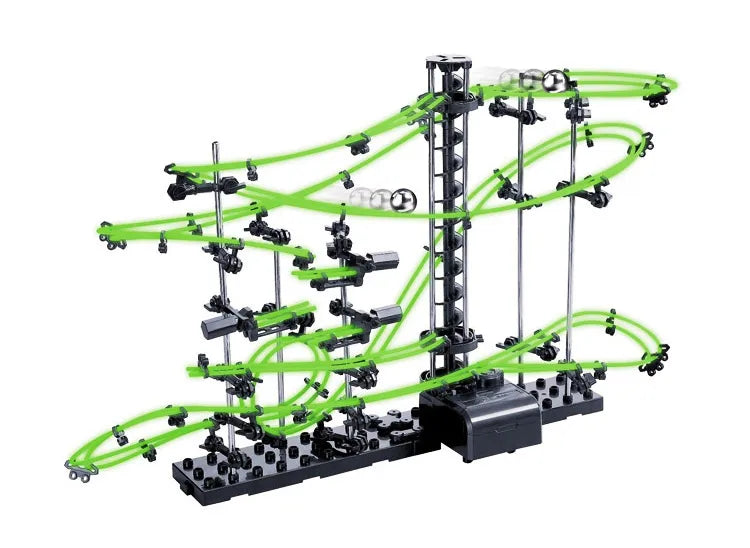 Toy roller coaster set with green tracks and black supports on a white background