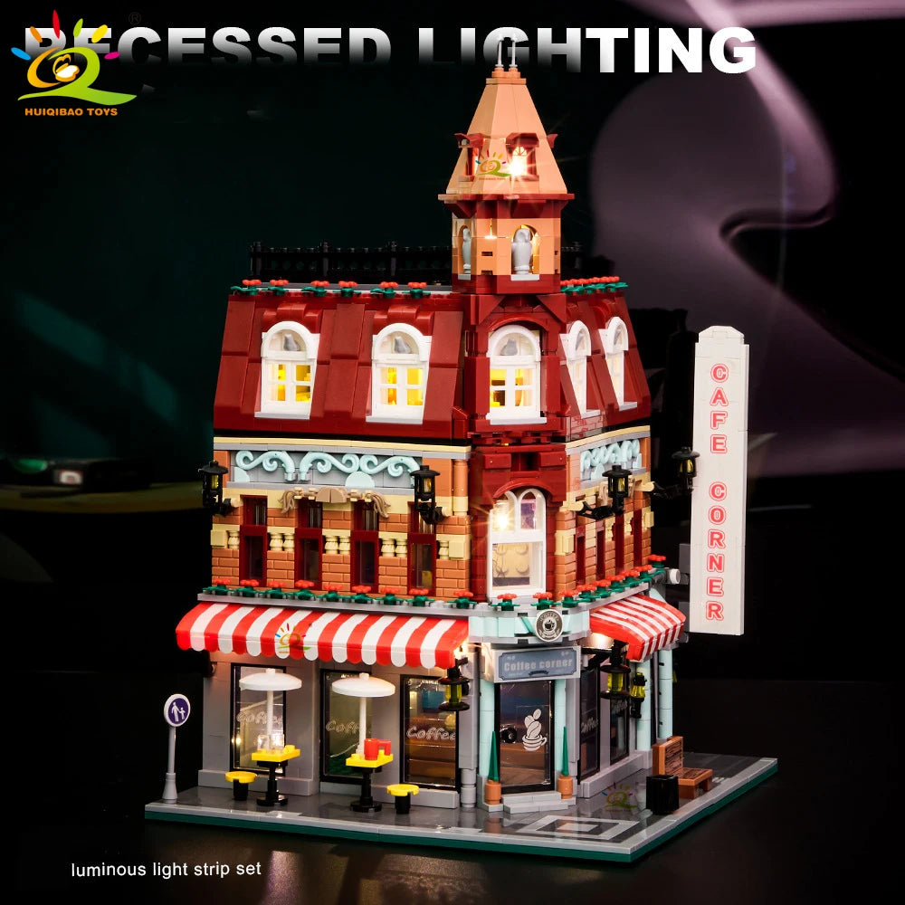 Toy cafe building with lit-up details and 'Cafe Corner' sign, labeled 'Decessed Lighting'.