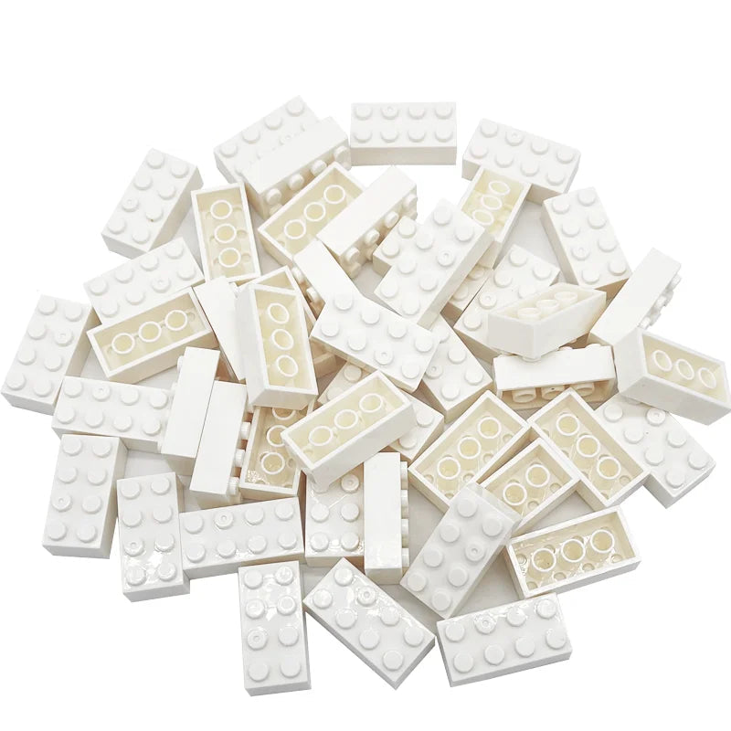 White building blocks with beige accents on a white background