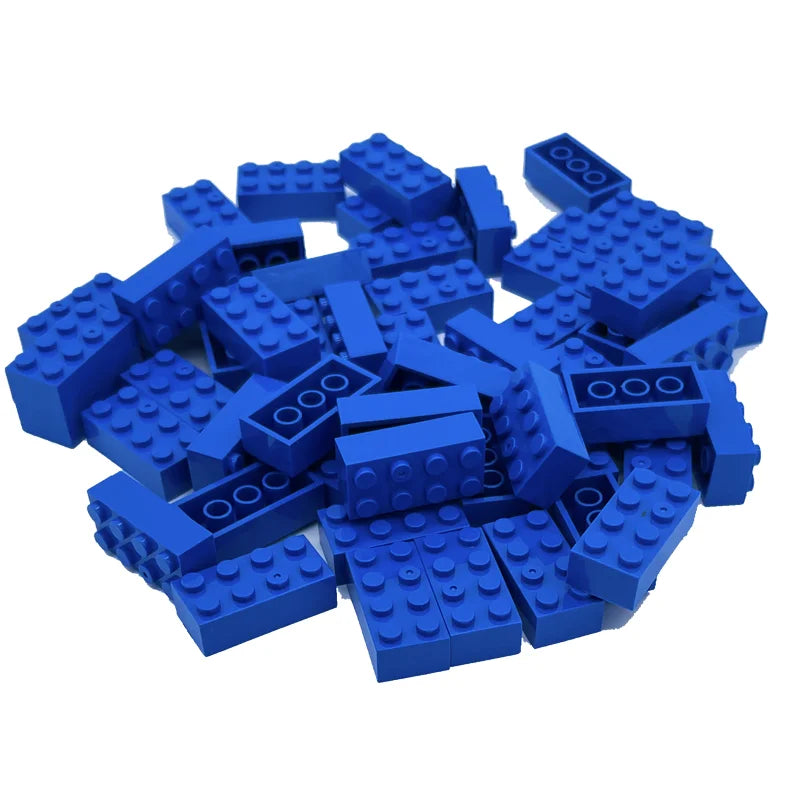 Pile of blue building blocks on a white background
