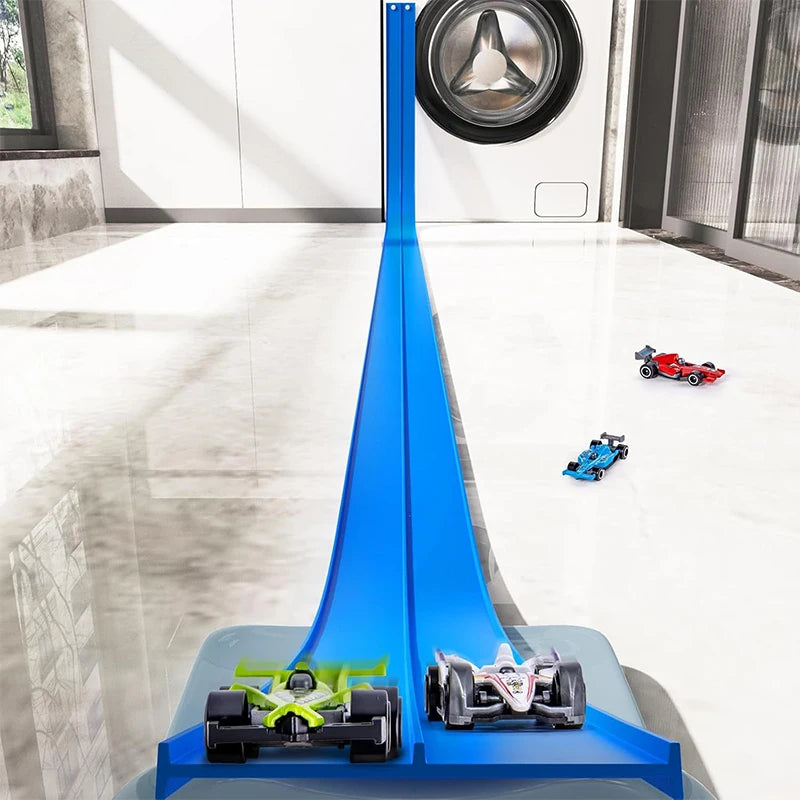 Toy car track set with toy cars on a modern indoor floor.