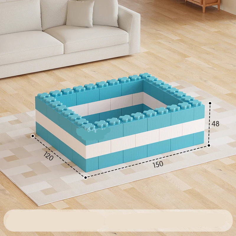 Blue and white foam building blocks set on a wooden floor with dimensions displayed.
