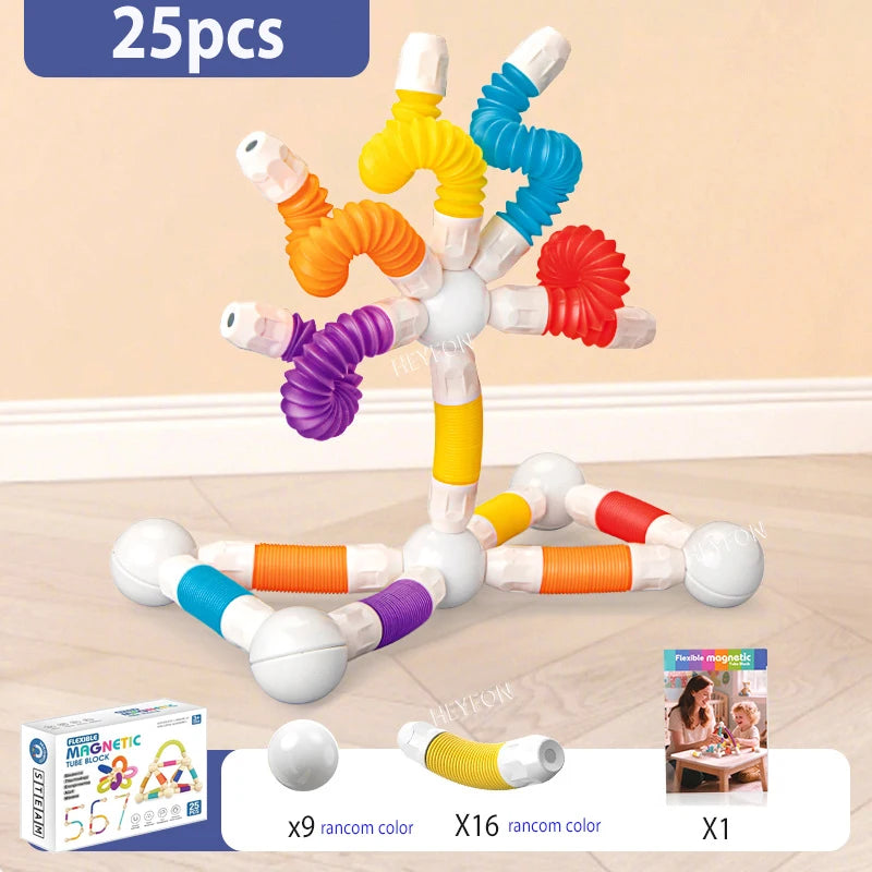 Colorful magnetic building toy set with packaging on a wooden floor