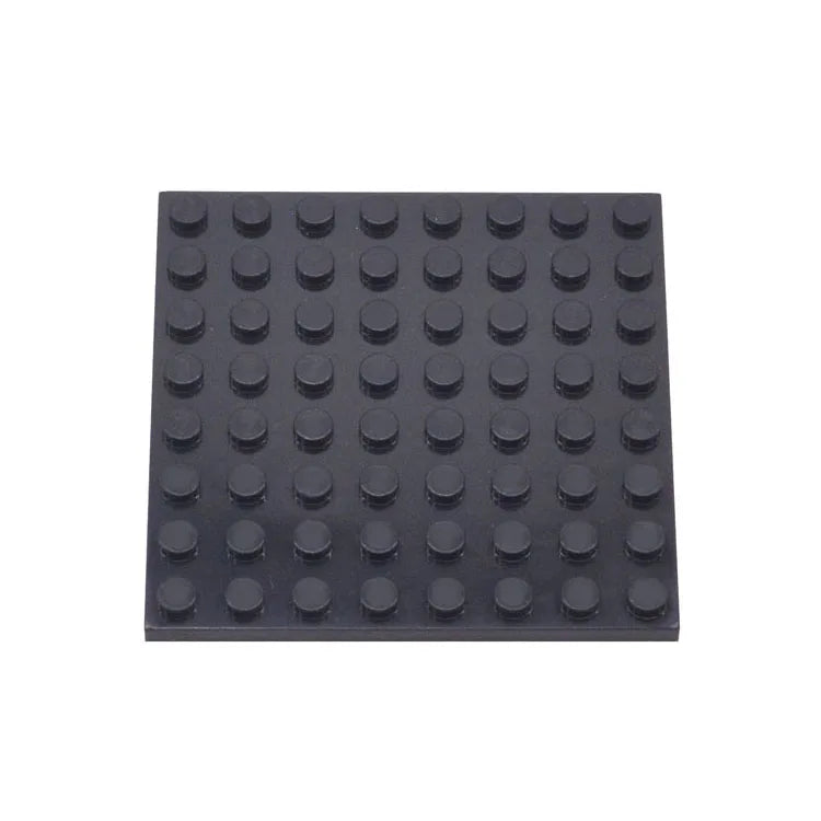Black building block baseplate on a white background