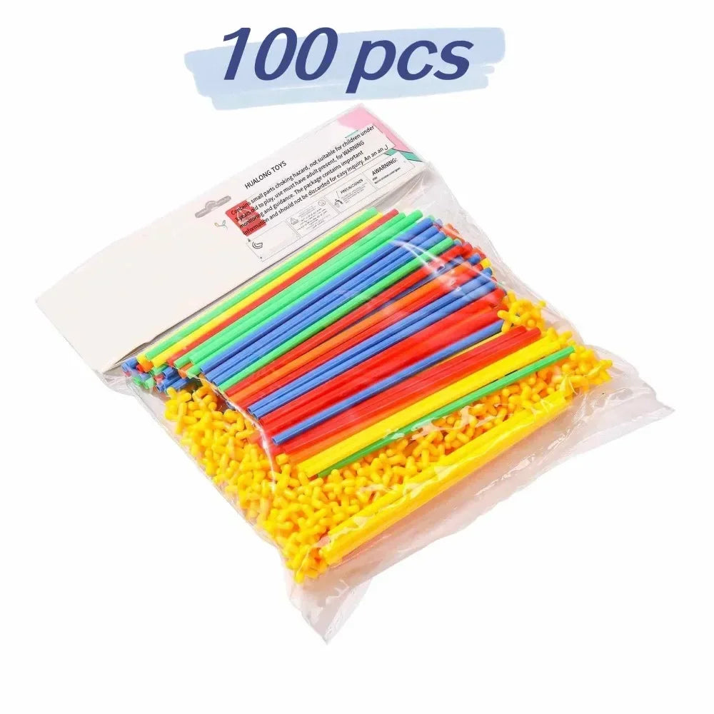 Packaged colorful interlocking bricks with a label indicating '100 pcs' on a white background.