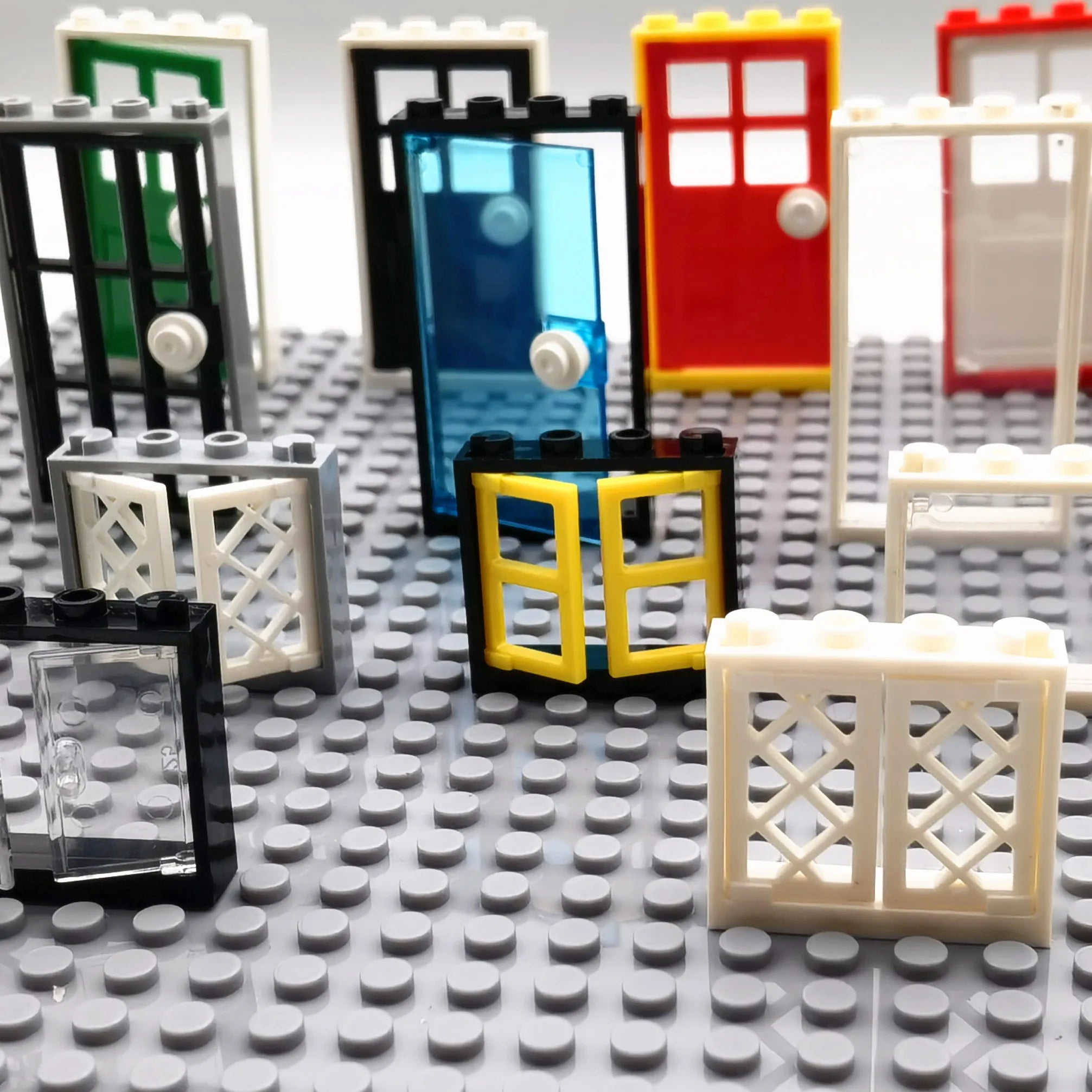 Collection of colorful building blocks on a gray baseplate