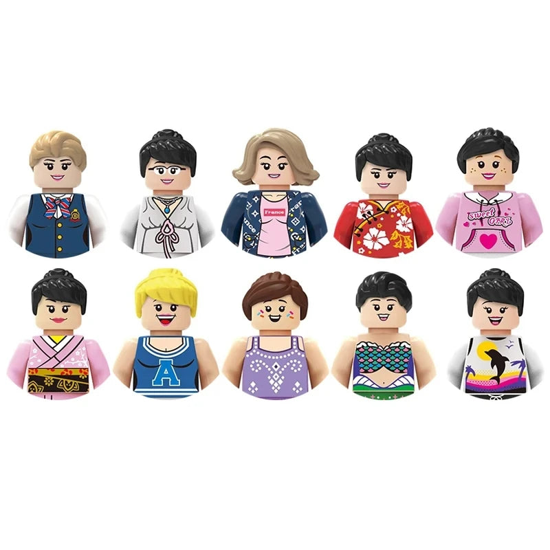 Set of nine colorful toy figures with various outfits on a white background