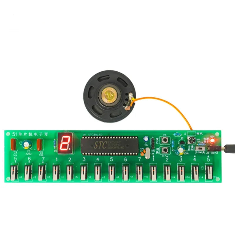 Electronic circuit board with components on a white background