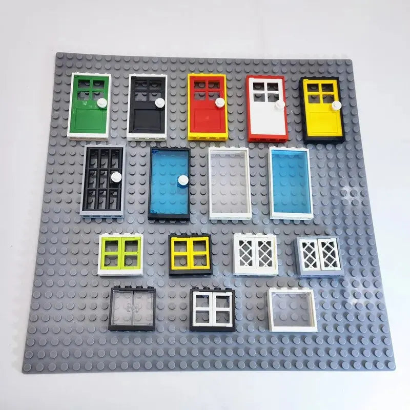 Collection of colorful doors and windows on a gray baseplate.