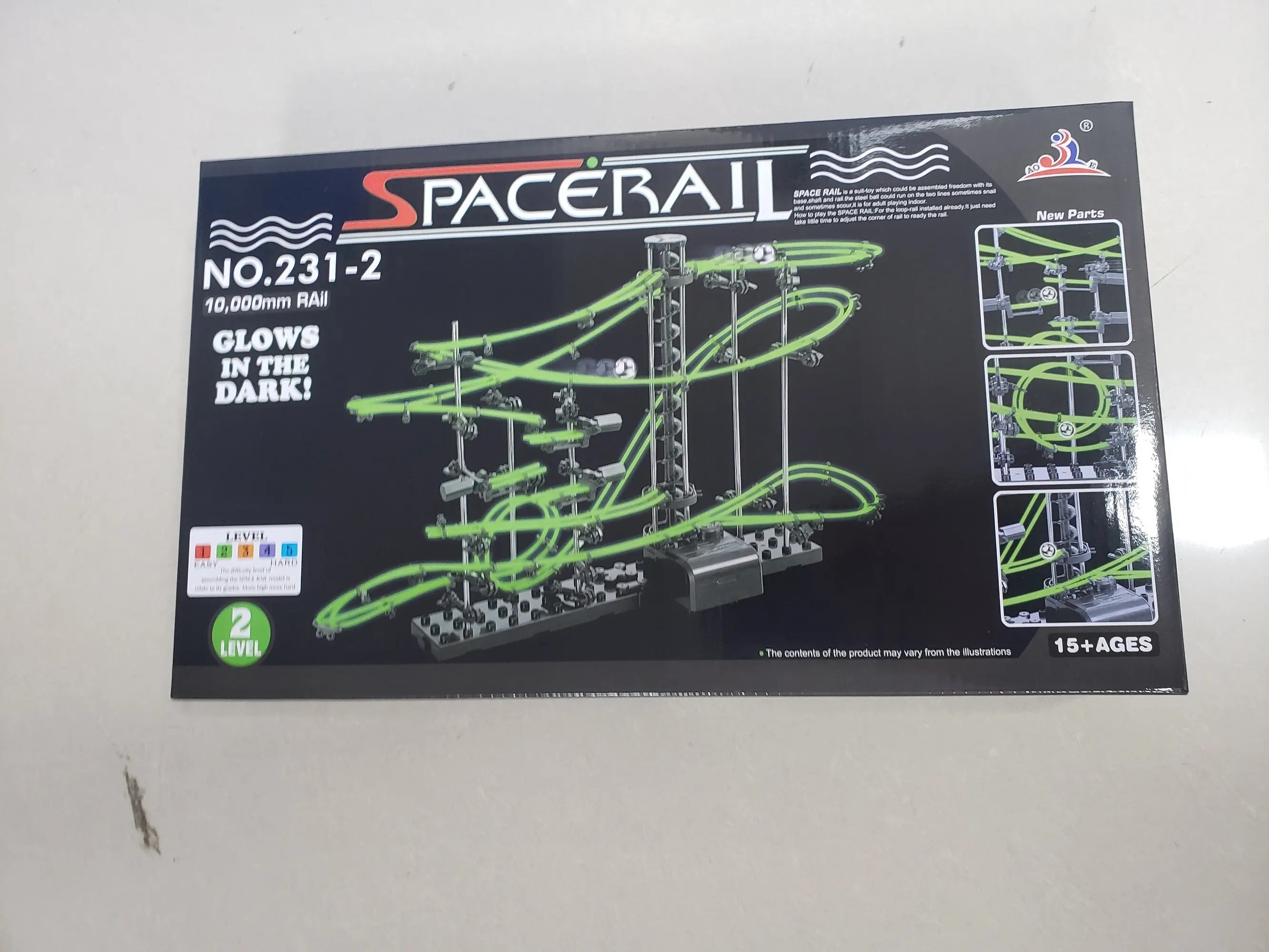 SpaceRail II toy set packaging with green tracks on a black background