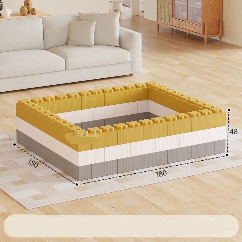 Children's play mat made of interlocking blocks in a living room setting
