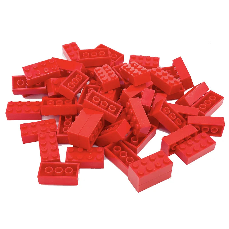 Pile of red building blocks on a white background